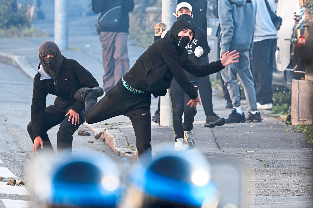 3. Protesters facing off with police near Kerichen High School in Brest. More than 1,200 high schools saw protests, with police using tear gas and rubber bullets in some cases.