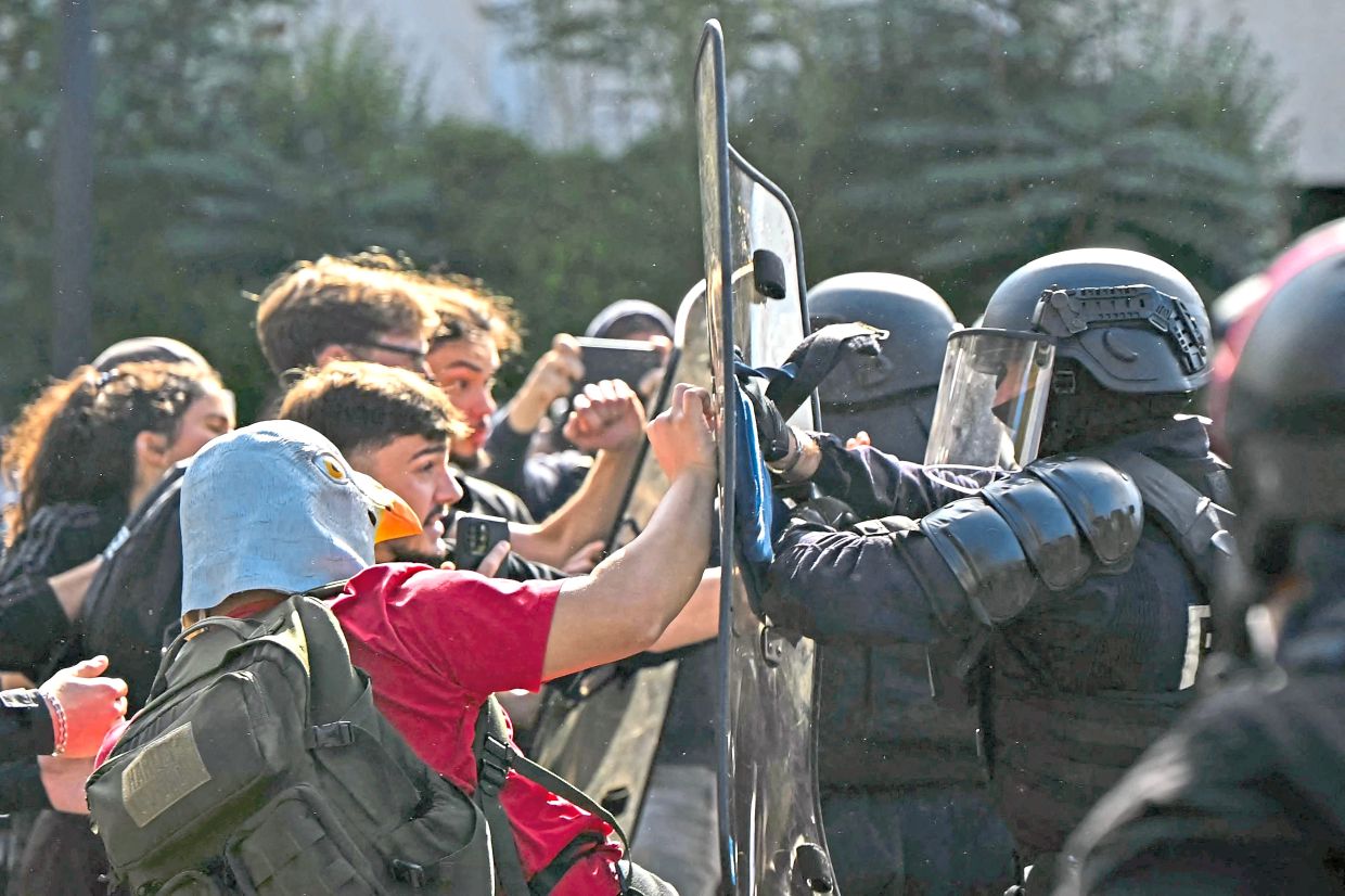 1. Anti-riot police confront protesting students outside Le Corbusier secondary school in Aubervilliers, north of Paris. Students have been protesting since late September over timetables, overcrowded classes, teacher shortages and classrooms made unbearable by this year’s heatwaves.