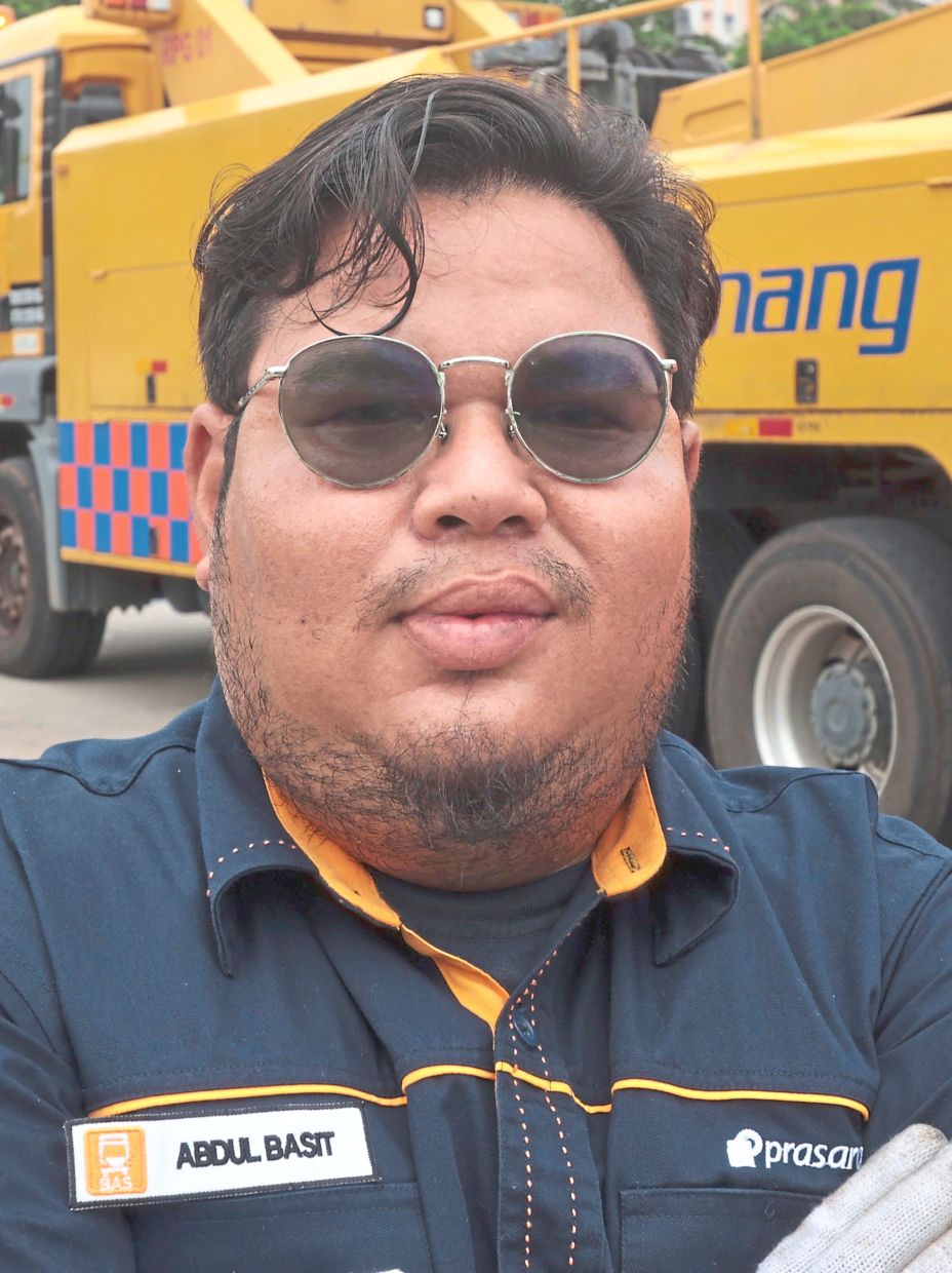 Basit recalls one incident where the team had to manage traffic while working to recover an overturned bus.