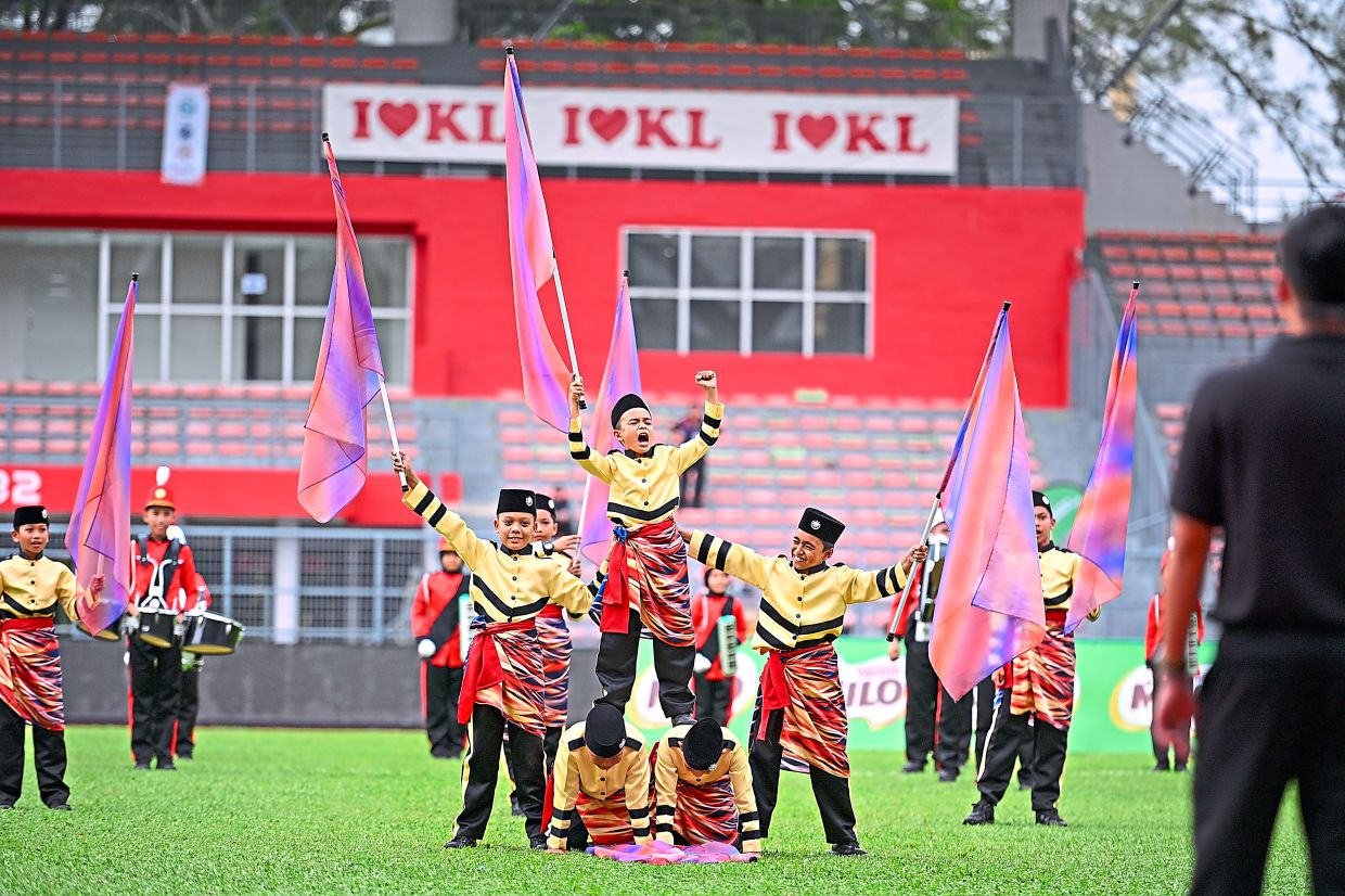 The band from SK Seri Pinang performing at the Asian Music Games (AMG) 2026.