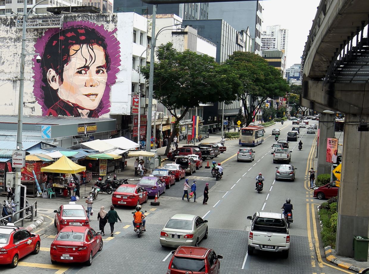 A mural of the late Datuk Sudirman Arshad painted on the side of a building at Jalan Chow Kit in Kuala Lumpur.