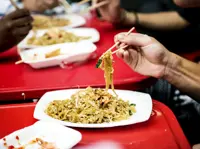 Foreign couple accused of planting chest hair in food to avoid bill