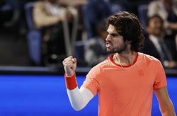 Tennis-Alcaraz sinks Lehecka to retain Japan Open crown