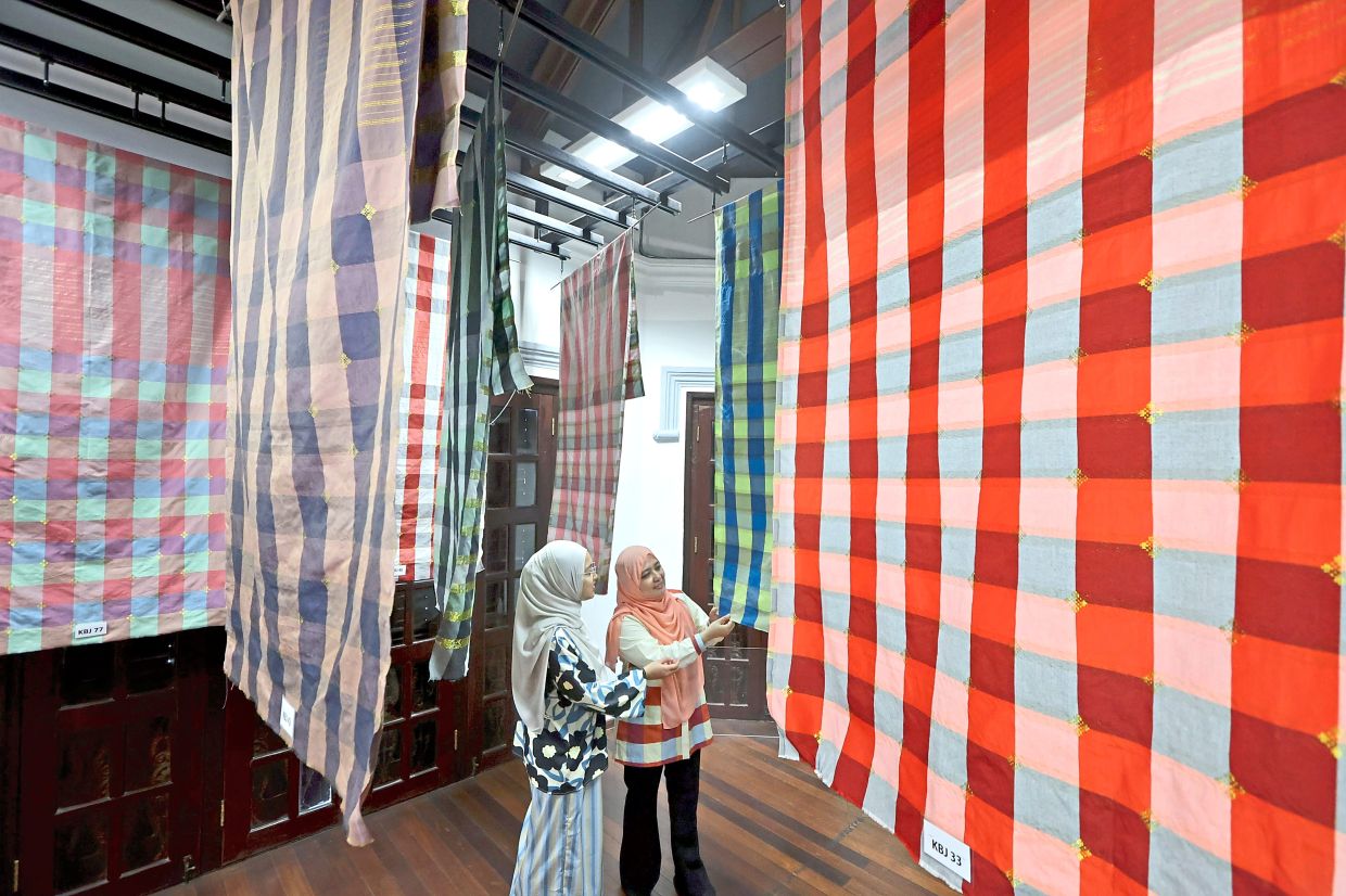 Visitors can explore the craftsmanship behind the woven Kain Benang Johor at Galeri Tenun Johor.