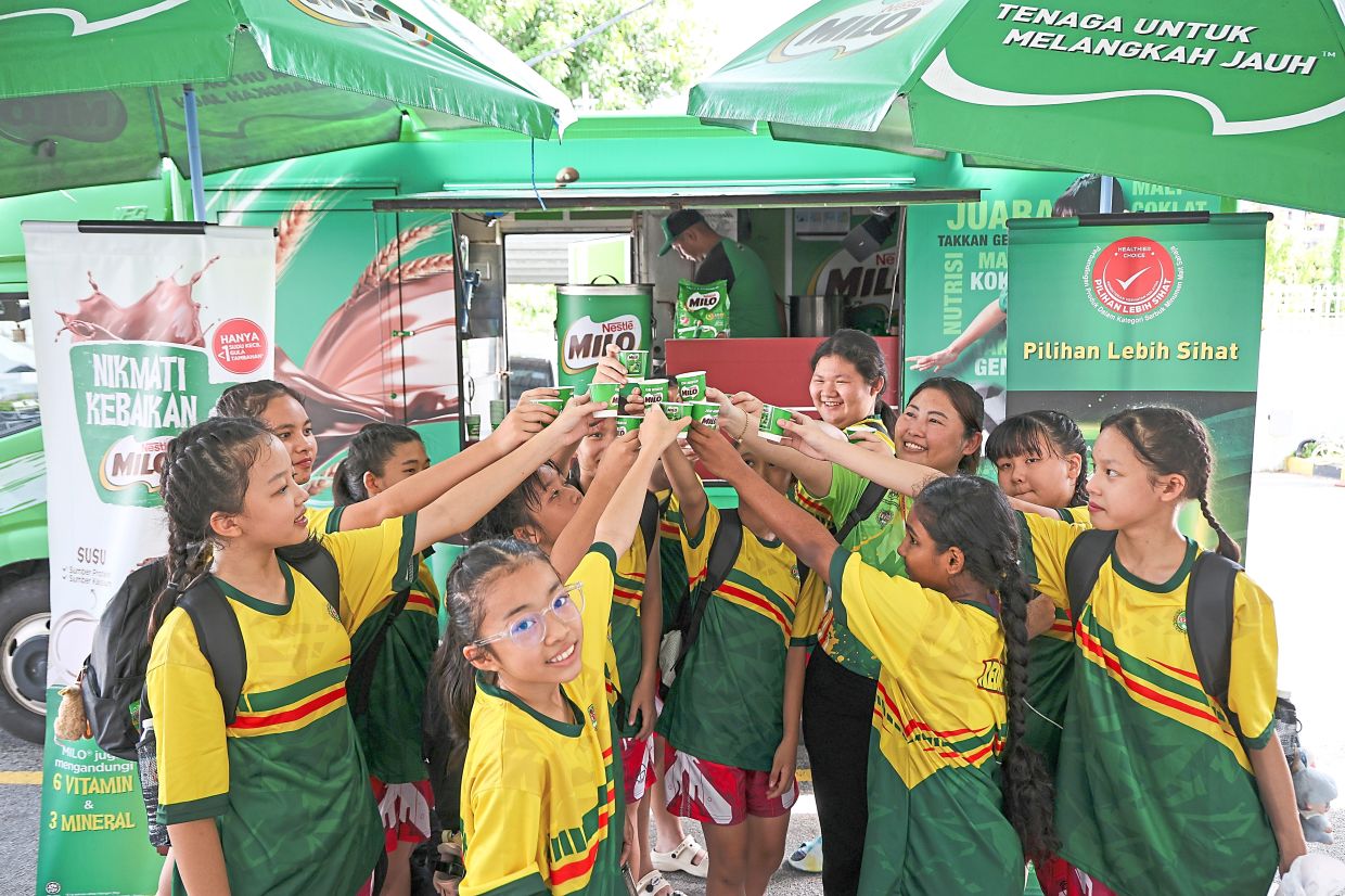 The iconic Milo truck remains a familiar sight for young athletes enjoying its signature chocolate malt drink.