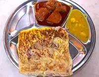 Roti canai with spicy curry a hit at Kepong kopitiam
