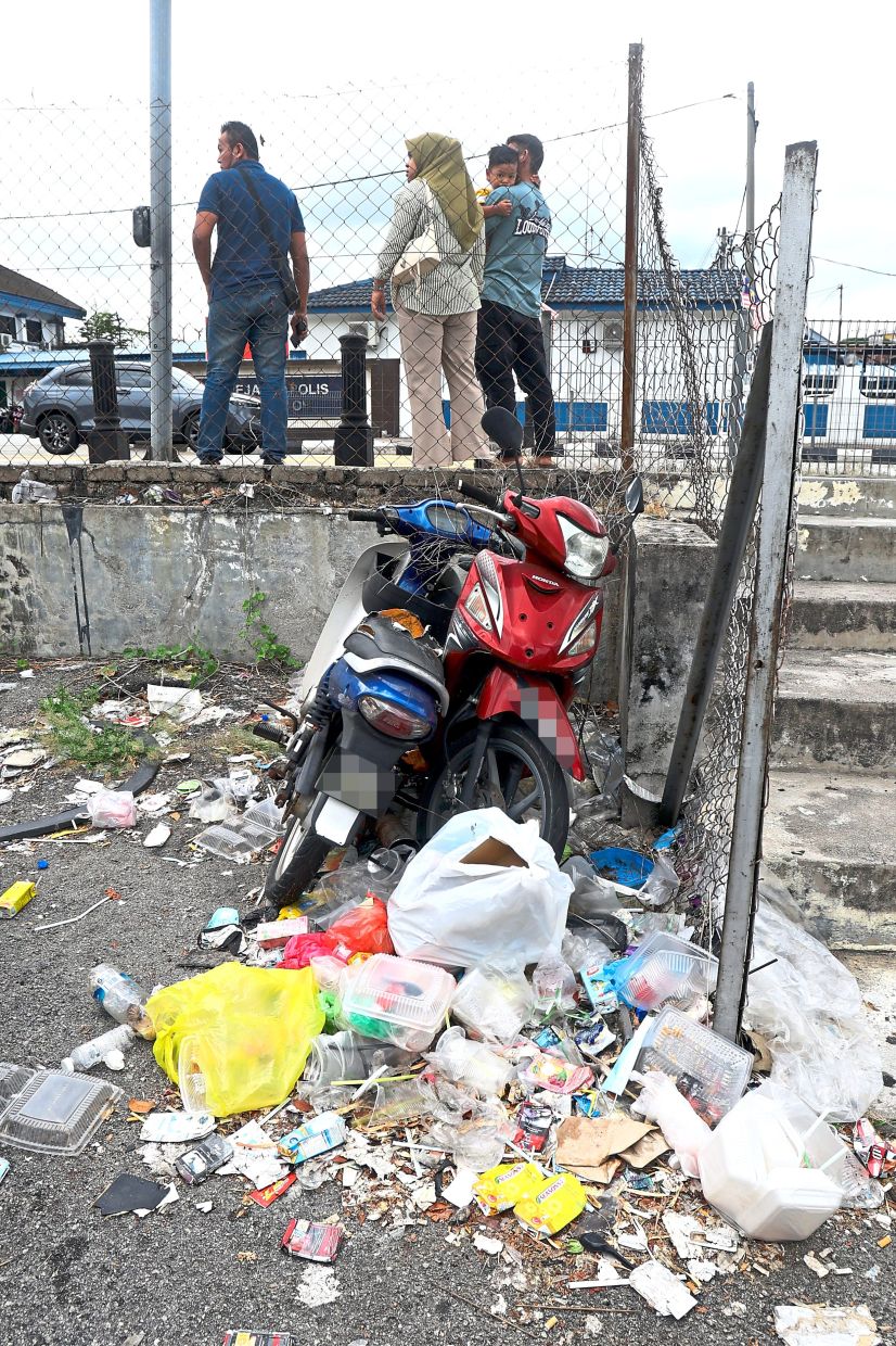 Rubbish found along a walkway opposite the police station.