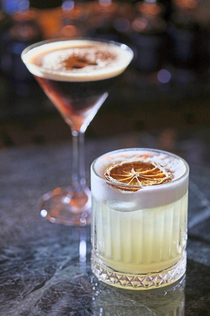 Whiskey Sour (front) and Espresso Martini.