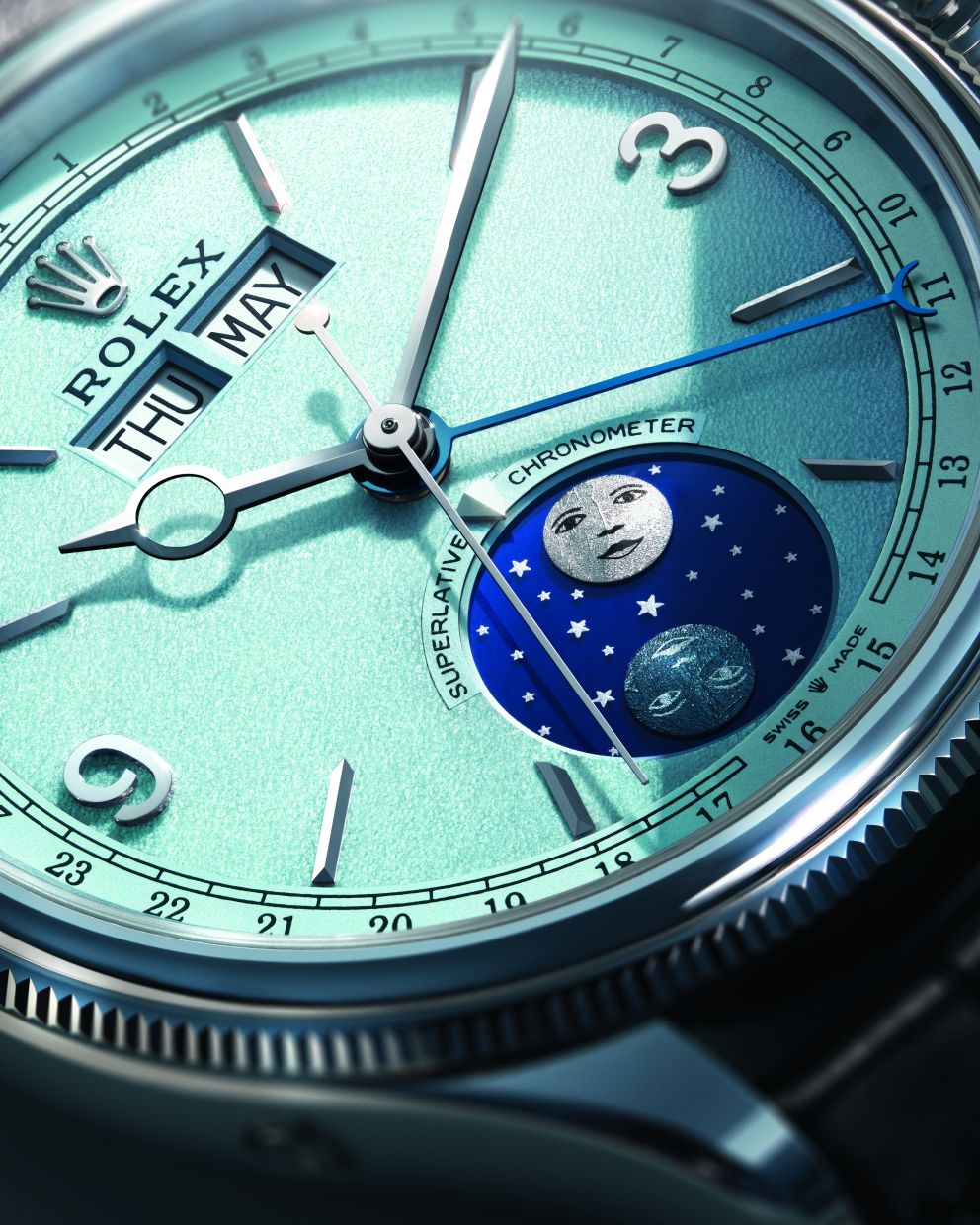 Perpetual Padellone in 950 platinum featuring a grained-finish, ice blue dial.