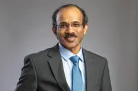 India-born US citizen drives research into light at sanctioned Chinese school