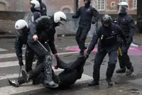 Protesters clash with police in Brussels as unions and students march
