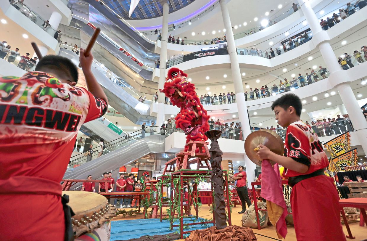 One of the troupes executing their gravity-defying stunts during the competition in George Town.