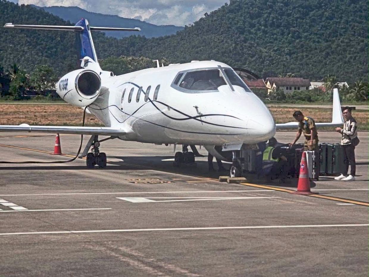Flying high: Police seized the jet and crystal methamphetamine at Luang Prabang International Airport and detain 13 people in connection with the case. — Social Media
