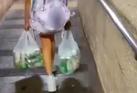 Hong Kong police arrest parents of 10-year-old girl made to carry bags of beer