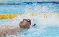Swimming-South Africa's Coetze breaks men's 50m backstroke short-course world record