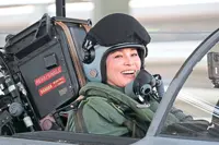 Queen flies solo in fighter jet