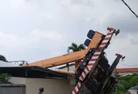 Elderly man injured after crane topples onto nursing home
