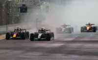 Motor racing-Verstappen claims first Singapore win as nine retirements mar chaotic sprint