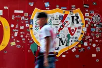 Soccer-Rayo-Athletic match abandoned after fans protest against club owner