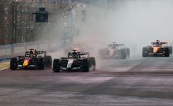 Motor racing-Verstappen wins Singapore sprint after chaotic start in wet conditions