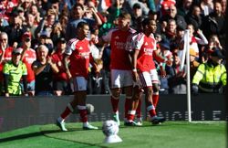 Soccer-Guimaraes grabs winner as Arsenal rally to beat Leeds