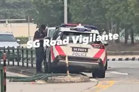 Singapore police car crashes into road divider; cop helping with investigations