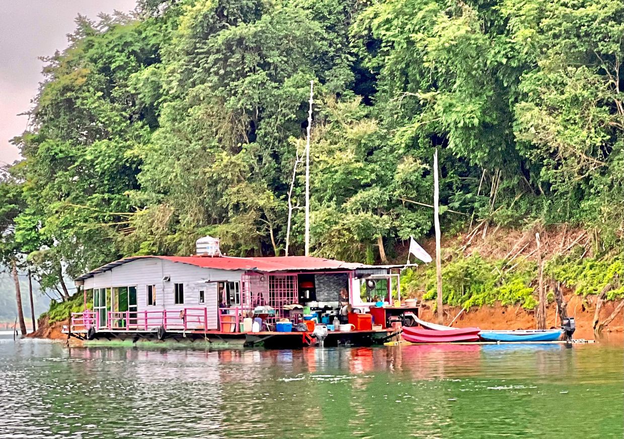 The Royal Belum State Park has a houseboat experience for tourists.