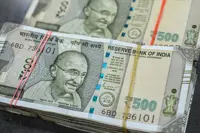 India rolls out support for its plunging currency