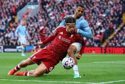 Soccer-Man City silence hostile Anfield with 3-0 win over Liverpool