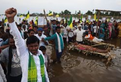 As rising waters flood homes and temples, villagers protest India's $87 billion river-linking project