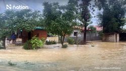Rescuers evacuate bedridden patients as overnight floods hit almost 100 homes in Phetchaburi, Thailand