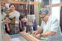 The Silk Keffiyeh Project: Weaving hope