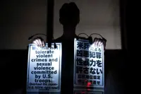 Japan, US review troops' off-duty rules after Okinawa killing
