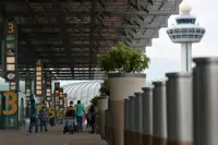 Two men to be charged over stolen bank cards on flight from Ho Chi Minh City to Singapore