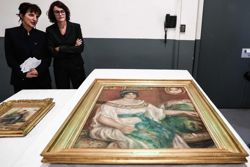 Stolen Renoir paintings found behind wall in France