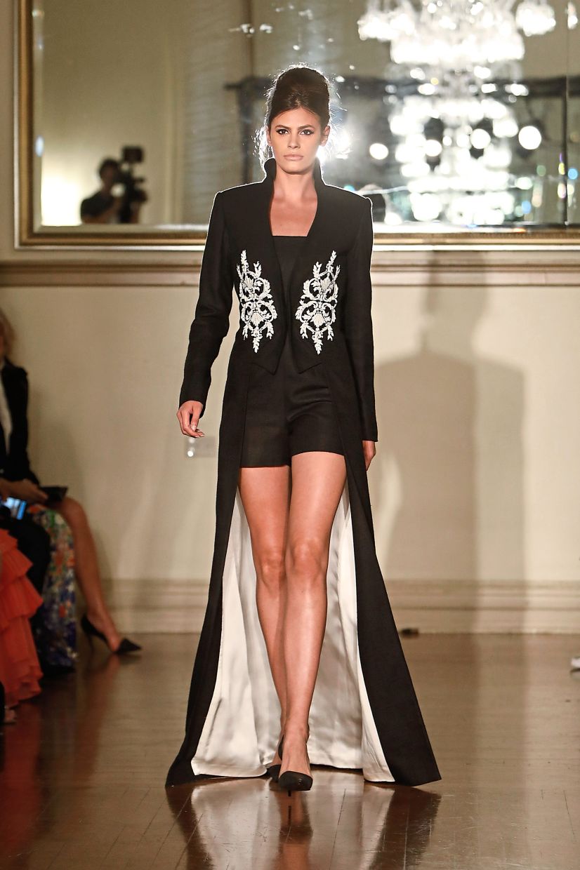 Contemporary designs featuring heritage elements are finding strong demand, as seen in this look’s intricate white embroidery inspired by traditional motifs. Photo: Zang Toi