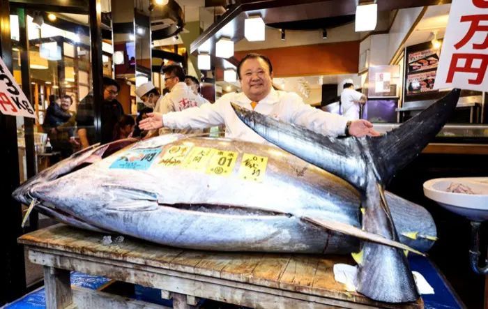 A file picture of Kimura with a 243kg bluefin tuna he won with a 510.3 million yen bid at the New Year's auction at Toyosu fish market, Tokyo on Jan 5, 2026. - JIJI PRESS/AFP