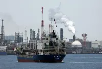 Japan approves three bills to ease oil import costs