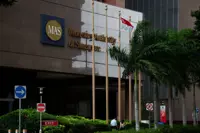 Singapore central bank keeps monetary policy unchanged, against expectation