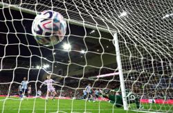 Soccer-English football 'dangerously exposed' to financial risk, regulator finds