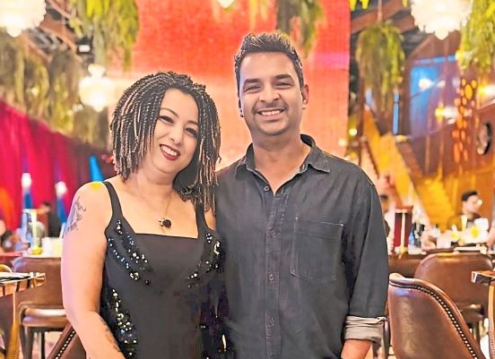 Poonam and husband Shashi Bhusan enjoy Malaysia’s diverse culture and food.