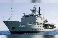 Australia navy investigating video camera found in ship bathroom