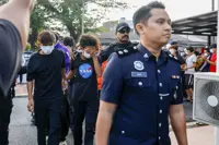 14, including two teens, charged with murder of teen in Gurun