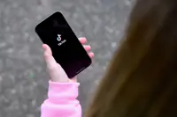 Australia says won't let big tech have 'unfettered' access to kids