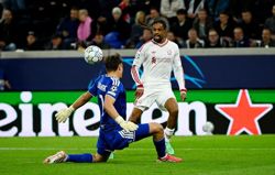 Soccer-Barcola bags hat-trick as Liverpool thrash LASK 6-3
