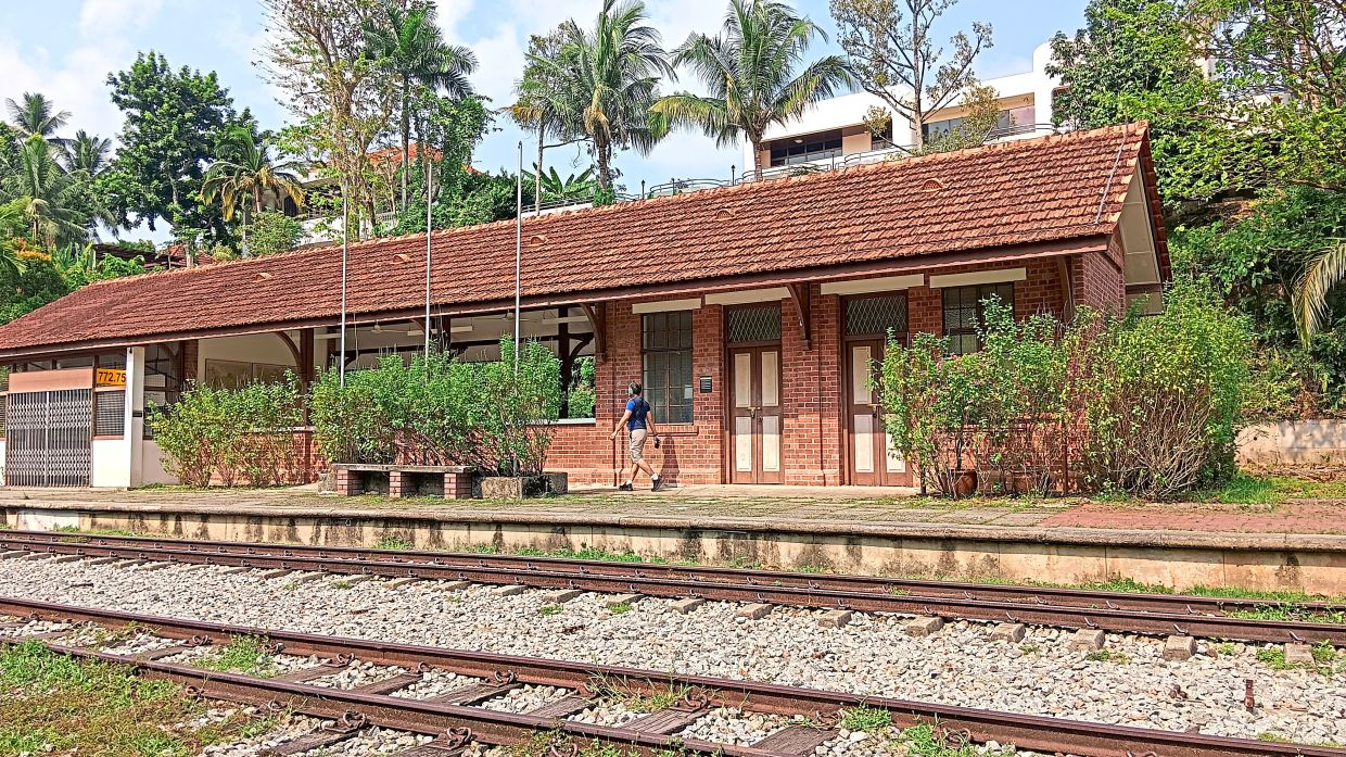 The refurbished Bukit Timah Railway Station (above) with preserved track-switching and signalling levers in the Signal Room (below).