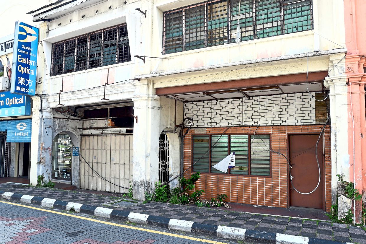 The former clinic (right) of the late Dr Wu Lien-Teh credited with developing the multi-layer gauze mask.