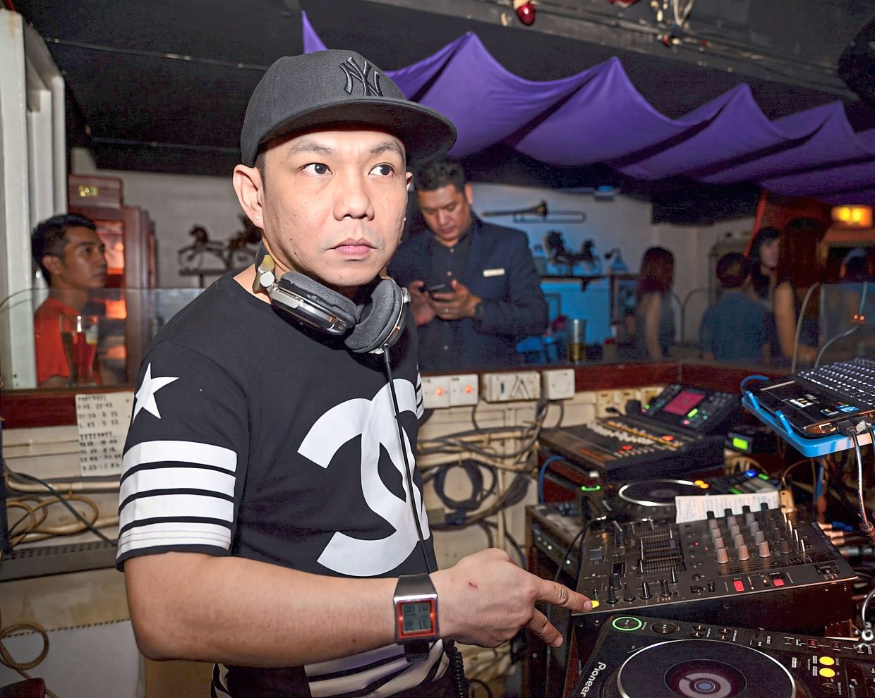 Syful on the decks at the fun pub in Kota Kinabalu.