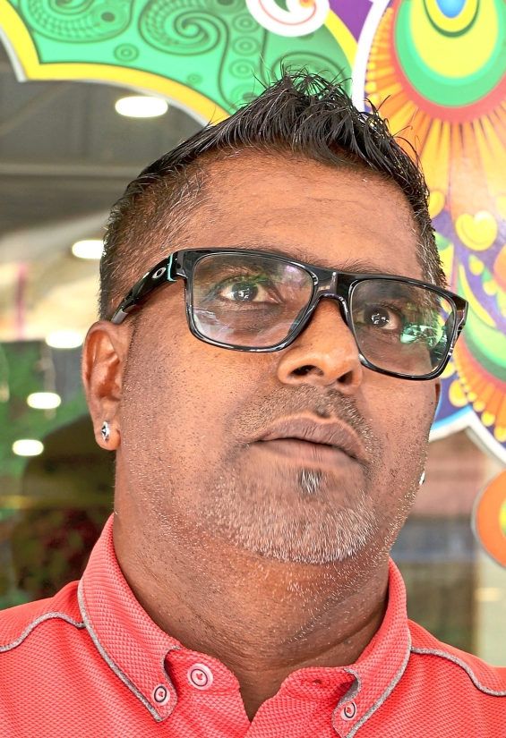Siva says an old building opposite his eatery should be cleaned up and preserved.