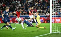 Soccer-Sensational Cisse powers Milan to victory as Leverkusen thump Lech Poznan